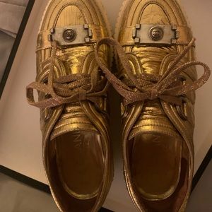 Authentic Chanel gold sneaker